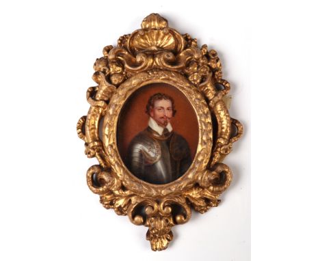 A 19th century oval portrait miniature on ivory, depicting George Villiers, First Duke of Buckingham, in an ornate gilt gesso