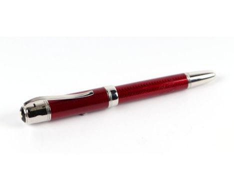 A red guilloche enamel fountain pen with iridium point nib, 15cms long.Condition ReportThe nib is a fine point, the filling m