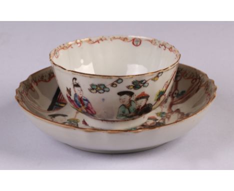 A Chinese famille rose tea bowl and saucer, decorated figures in a landscape, 