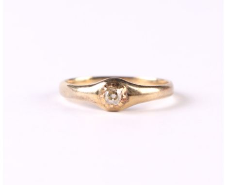 A small unmarked gold antique diamond solitaire ring, approx UK size K, 1.5g.