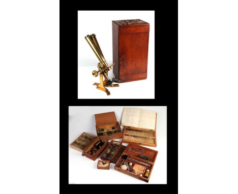 A late Victorian brass binocular microscope by Charles Collins, cased, with various objectives, eyepieces and slide preparati