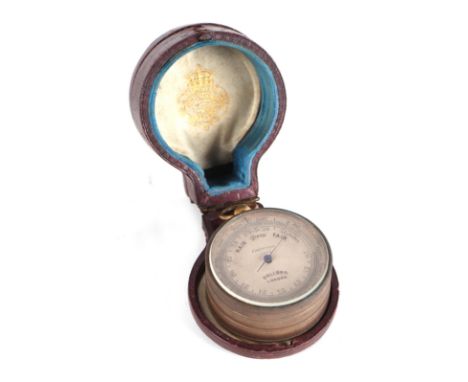 A 19th century Dollond of London gilt brass double sided pocket barometer, with opposing thermometer and compass dial, in a f