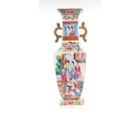 A late 19th century Chinese Canton Export famille rose two-handled vase decorated with figures and flowers, 30cms high.Condit