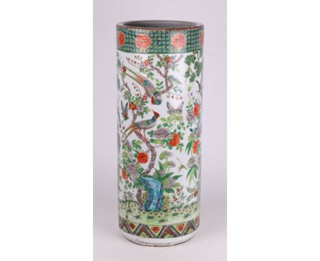 A Chinese late Qing dynasty famille vert stick stand decorated with exotic birds and foliage, 62cms high.Condition ReportTher