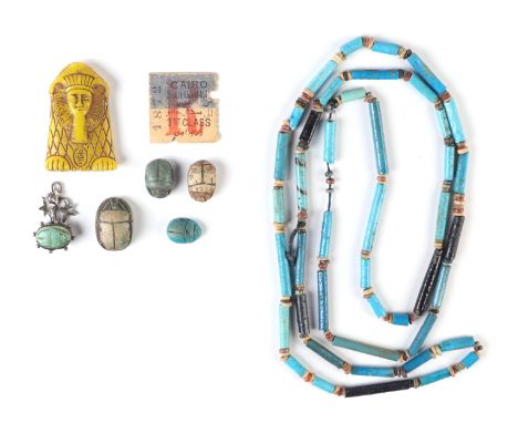 Antiquities.  An ancient Egyptian faience bead necklace. 110cm long, five faience scarab beetles( one sent as a pendant), a y