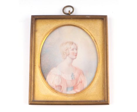 A 19th century portrait miniature on ivory depicting a young girl wearing a pink dress, framed & glazed, 9.5 by 10.5cms.  Ivo