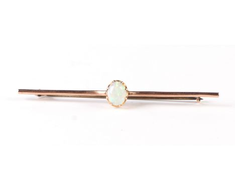 A yellow metal mounted opal bar brooch, 2.7g.