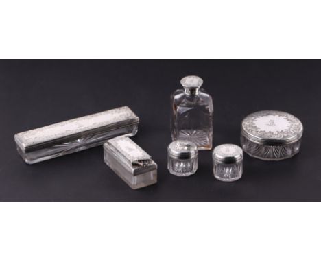 A Victorian heavy gauge silver lidded six piece dressing table set to include a screw-down ink pot, each piece with an engrav