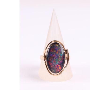 A 9ct gold ring set with a large oval opal cabochon, approx UK size 'S', 5.8g.Condition ReportLooks to be a solid stone but t