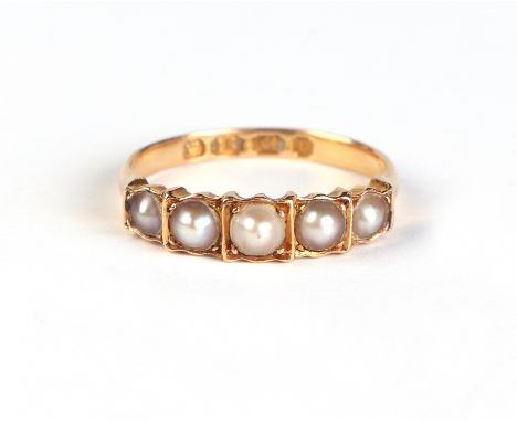 A Victorian 18ct gold ring set with five graduated pearls, approx UK size 'M', 2.3g.