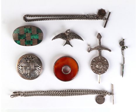 A group of antique and later silver jewellery to include Scottish and Celtic brooches and a silver Albert pocket watch chain.