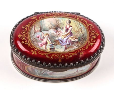 A continental (Austrian) oval enamel box decorated with figures and landscapes within panels with gilt highlights on a red gr