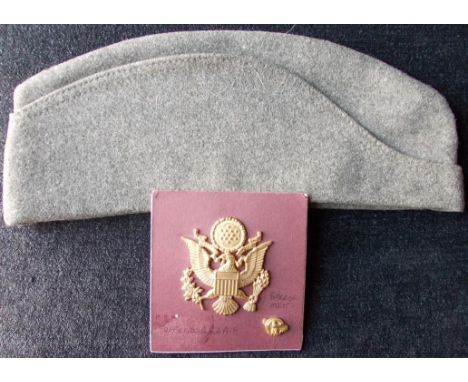 US Army Air Force officer's cap badge with merit badge 14cm x 11cm and another (2)