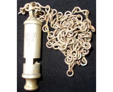 Army issue whistle and chain, dated 1943