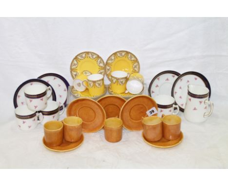 Royal Worcester yellow and gilt eight piece cabinet cup and saucer set. ten piece mottled light brown coffee set and a part V