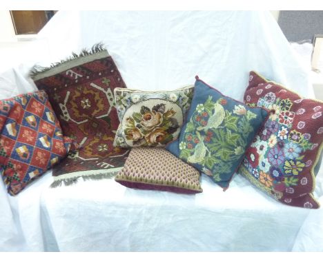 Small Afghan red ground rug together with five tapestry cushions