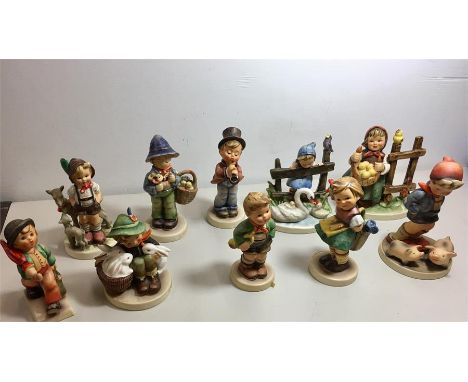 10 Hummel figurines all in good condition 