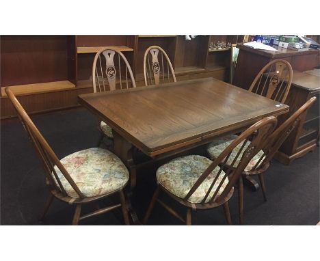 Ercol table and 6 chairs 