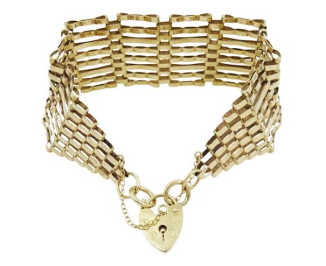 9ct gold eight bar gate bracelet with heart locket clasp, hallmarkedCondition Report:Approx 18.25gm