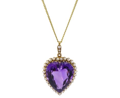 Edwardian gold amethyst and pearl pendant, heart shaped, buff top, mixed cut amethyst with split pearl surround, stamped 15ct