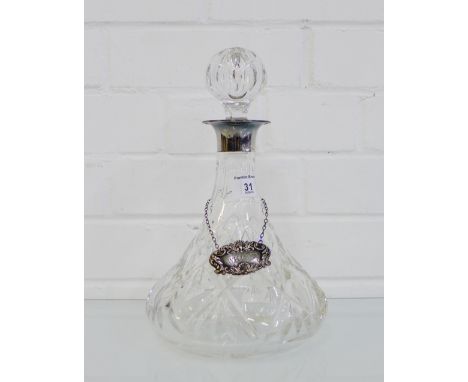 A silver mounted crystal spirits decanter and stopper, Sheffield 1977, together with a London silver Whisky decanter label (2
