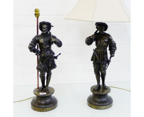 A pair of patinated Spelter figural table lamp bases and shades, 55cm high excluding light fittings, (2) 