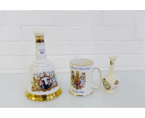 A Wade Bell's Scotch Whisky decanter commemorating the marriage of Prince Andrew with Sarah Ferguson, 1986, with contents, to