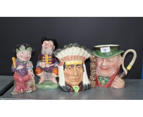 A Royal Doulton North American Indian character jug, together with Tony Weller jug and two Melba ware Toby jugs, tallest 20cm