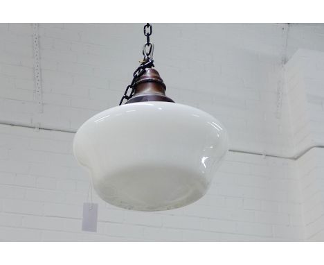 A white opaline glass ceiling light with bronzed metal mount
