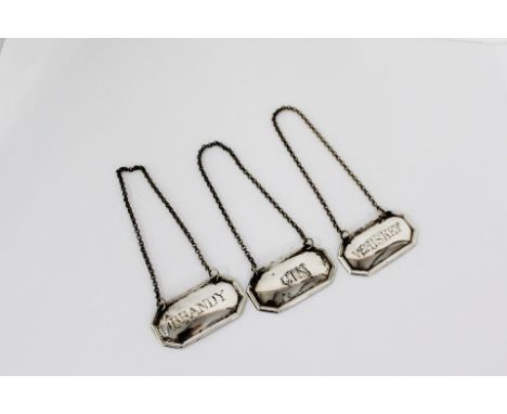 A set of three Epns decanter labels to include Brandy, Gin and Whiskey (3)