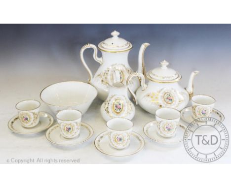 A Paris porcelain tea service comprising; a tea pot, water jug, milk jug, slop bowl, eight tea cups and saucers etc, each pie