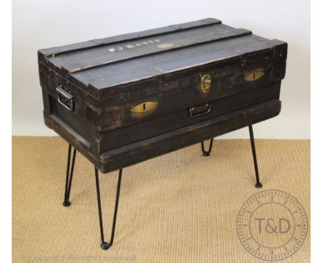 A 1930s metal bound and painted travel trunk, with brass maker's plaque for 'The Marshal Improved Air And Watertight Chest', 