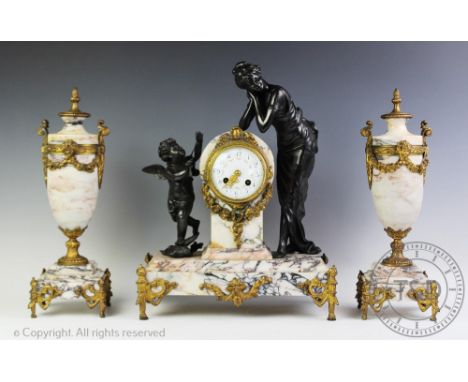 A French late 19th century marble clock garniture, the mantle clock with white enamel dial painted with floral garlands and A
