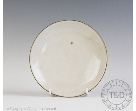 Lucie Rie (1902-1995) a studio pottery stoneware circular dish, decorated with a grey glaze with turquoise speck, seal mark t