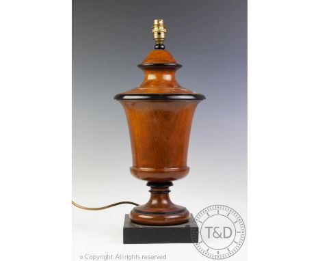 A modern turned wood table lamp, of vase form, on square base, 49cm H  CONDITION REPORT: Lighting lots are sold as decorative