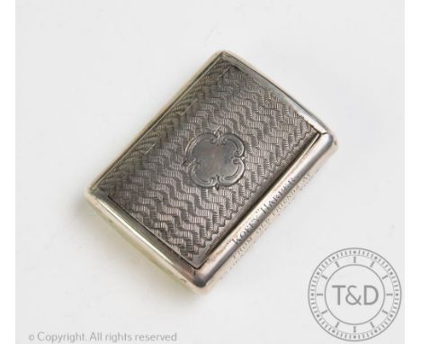 A Victorian silver presentation snuff box, John Edward Wilmot, Birmingham 1888, of rectangular form with hinged engine turned