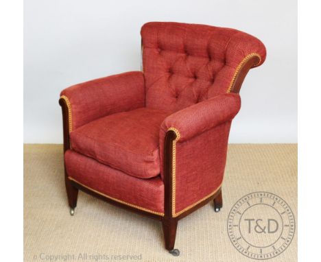 An Edwardian salon chair, button back upholstery, on tapered legs, 83cm H 