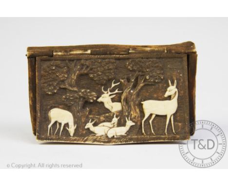 A 19th century German antler snuff box, of rectangular form with hinged cover depicting a stag, deer and fawns beneath trees,
