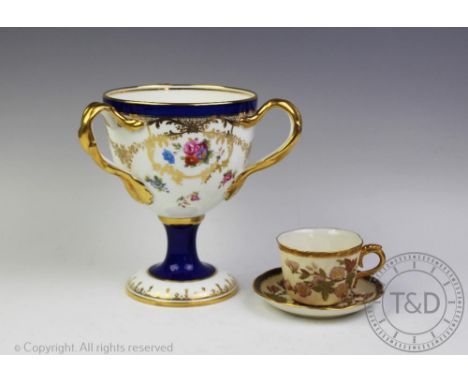 A Cauldon china porcelain tyg, the goblet form tyg florally enamelled within gilt decoration and cobalt borders, black printe