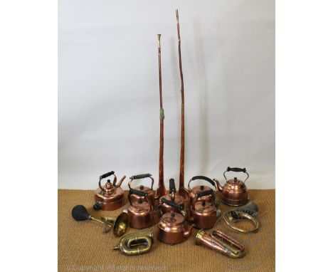 Two brass automobile horns, one of circular form, with a copper and brass bugle, a Lucas brass automobile horn, with two copp