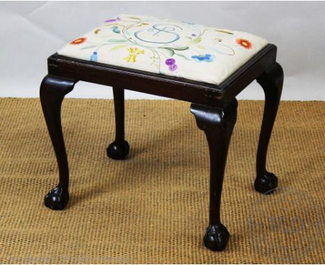 A George III style stool, with ball and claw feet, 47cm H x 52cm W, with a Victorian walnut circular footstool with tapestry 