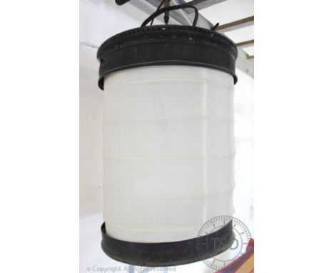 A Chinese bronzed metal cylindrical hall lantern, 48cm high, with two glass hall lanterns(3) CONDITION REPORT: Lighting lots 