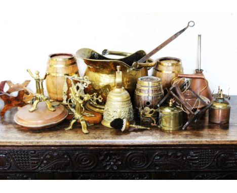 A selection of 19th century brass and copper wares to include coopered ale barrels, a copper kettle, a brass coal scuttle, a 