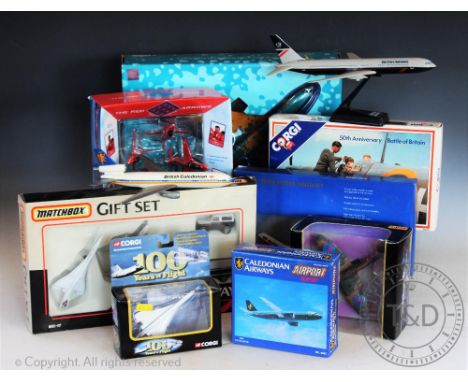 Fourteen aircraft related diecats and plastic items, comprising; five unboxed aircraft and nine boxed examples including Corg