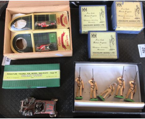 An assortment of diecast toy figures, to include Dinky toys Station Staff set No 001, a set of Britains Military Figures, thr