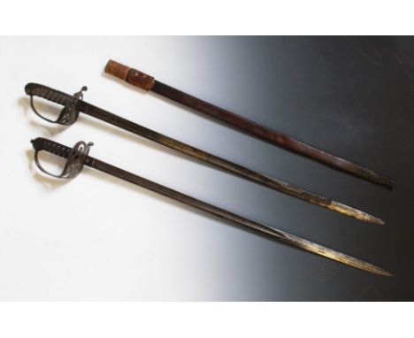 An 1845 pattern cavalry sword by &nbsp;Wilkinson’s, numbered 23503, with 81cm blade, leather mounted grip and associated scab