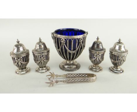 EDWARD VII SILVER FIVE-PIECE CONDIMENT SET comprising four pierced pepperettes with blue glass liners, together with similar 