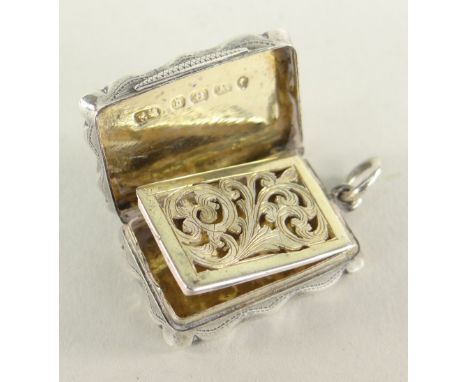 VICTORIAN SILVER VINAIGRETTE having engine turned exterior with vacant cartouche and belt buckle design border, Birmingham 18