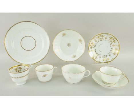 SWANSEA PORCELAIN comprising gilt and white trios, cups and saucers, two with moulded borders (gilt rubbed)