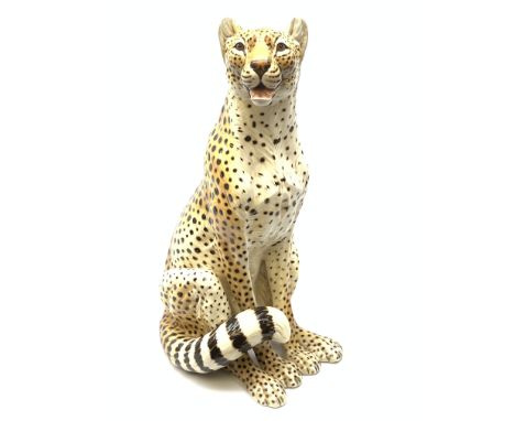 A large Italian pottery fireside model of a Cheetah, H66cm. - Condition Report 